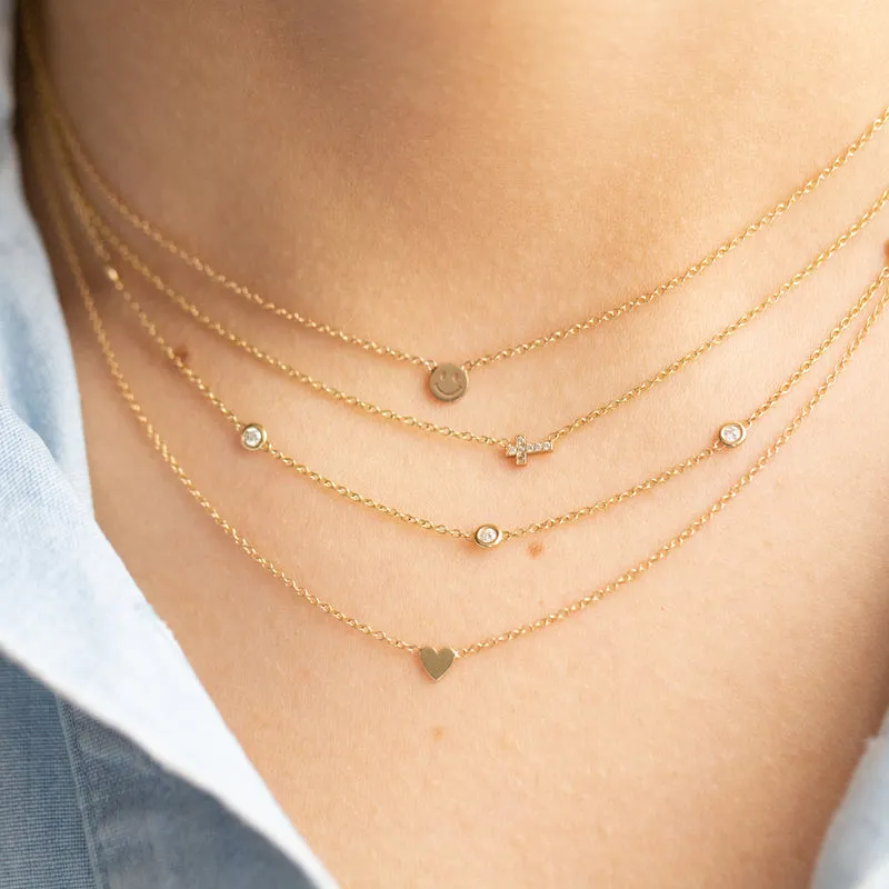 Itty Bitty Diamond Cross Necklace in Yellow Gold