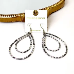 Layered Faux Navajo Pearl Beaded Teardrop Earrings with Clear Glass Spacers in Silver Tone