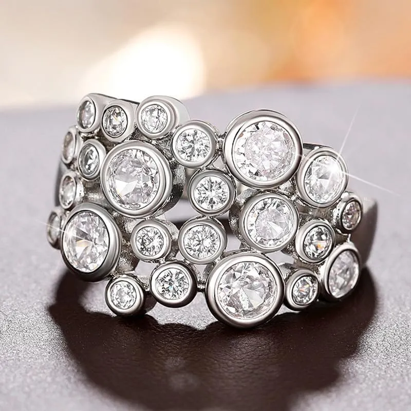 LIOYSIUT 925 Sterling Silver Bubble Circle Geometric CZ Ring Moissanite Small Circle Eternity Ring, Round Emerald Cut Color Lab Created Diamond Sterling Silver Wedding Band Ring for Women Size 7