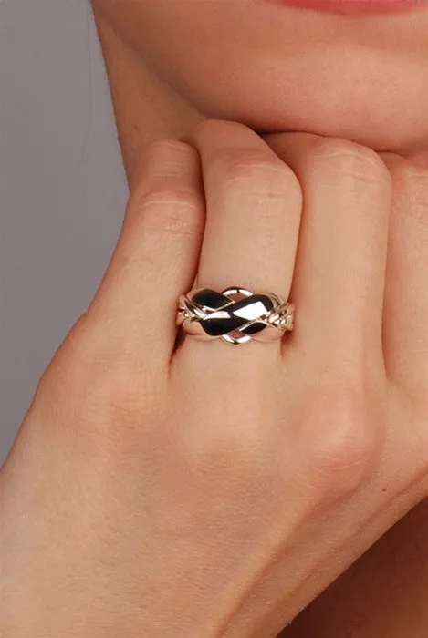 Retired LADIES 4 band STERLING SILVER Puzzle Ring 42SL